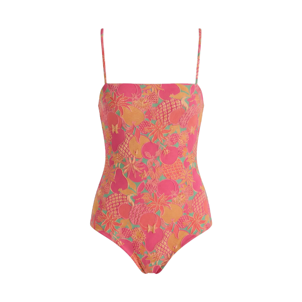 A one-piece swimsuit with thin shoulder straps, featuring a vibrant fruit print in shades of pink, orange, yellow, and green on a white background.