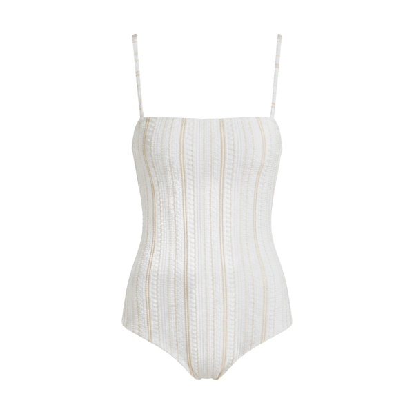 A white one-piece swimsuit with a textured vertical stripe pattern in beige and white, featuring thin adjustable shoulder straps, shown against a plain white background.