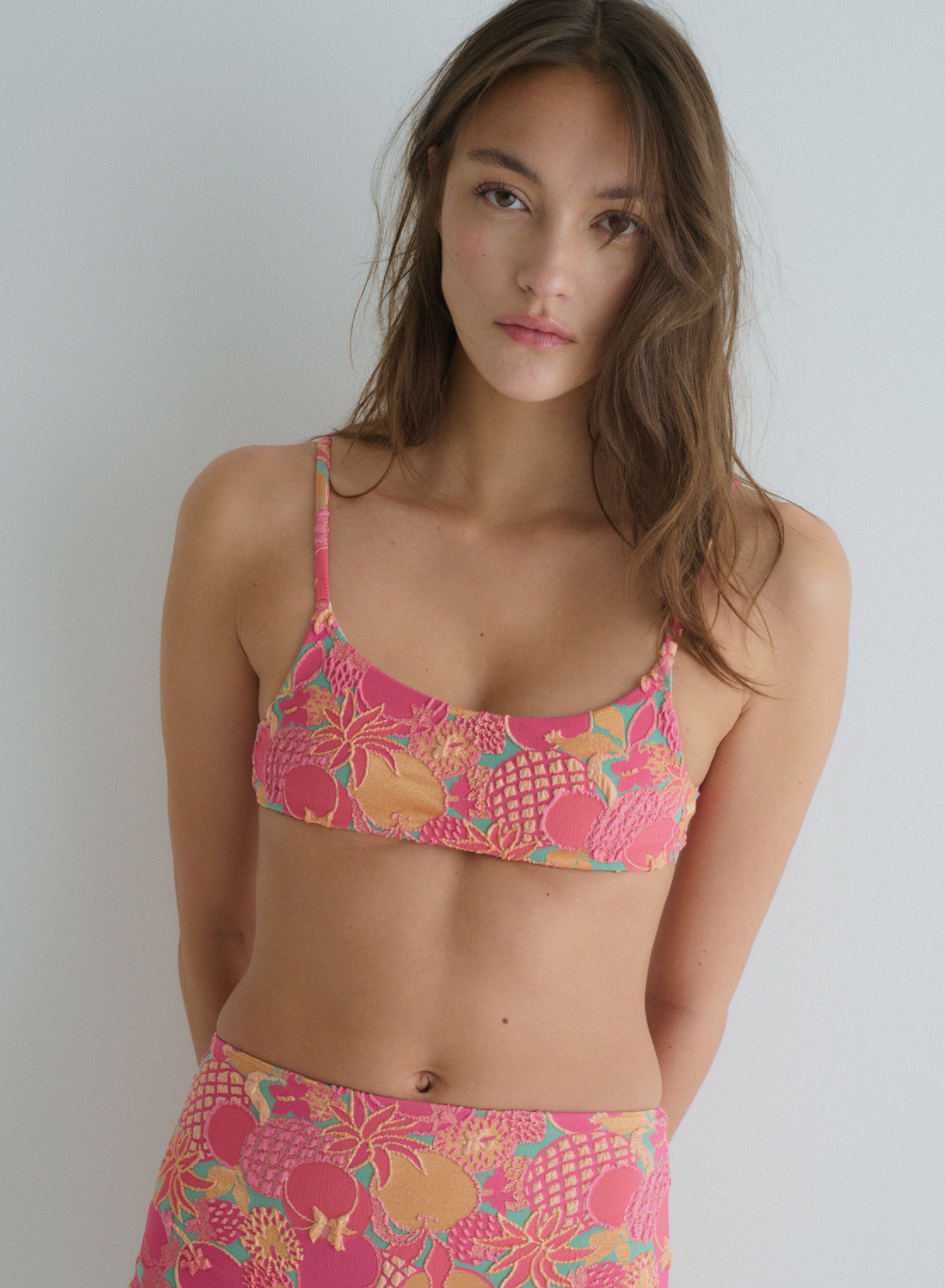 dark pink floral bikini top swimsuit in jacquard fabric, with thin straps, full coverage, front view