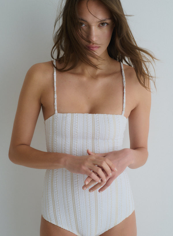 white one-piece swimsuit with square neckline and thin straps in jacquard fabric, front view